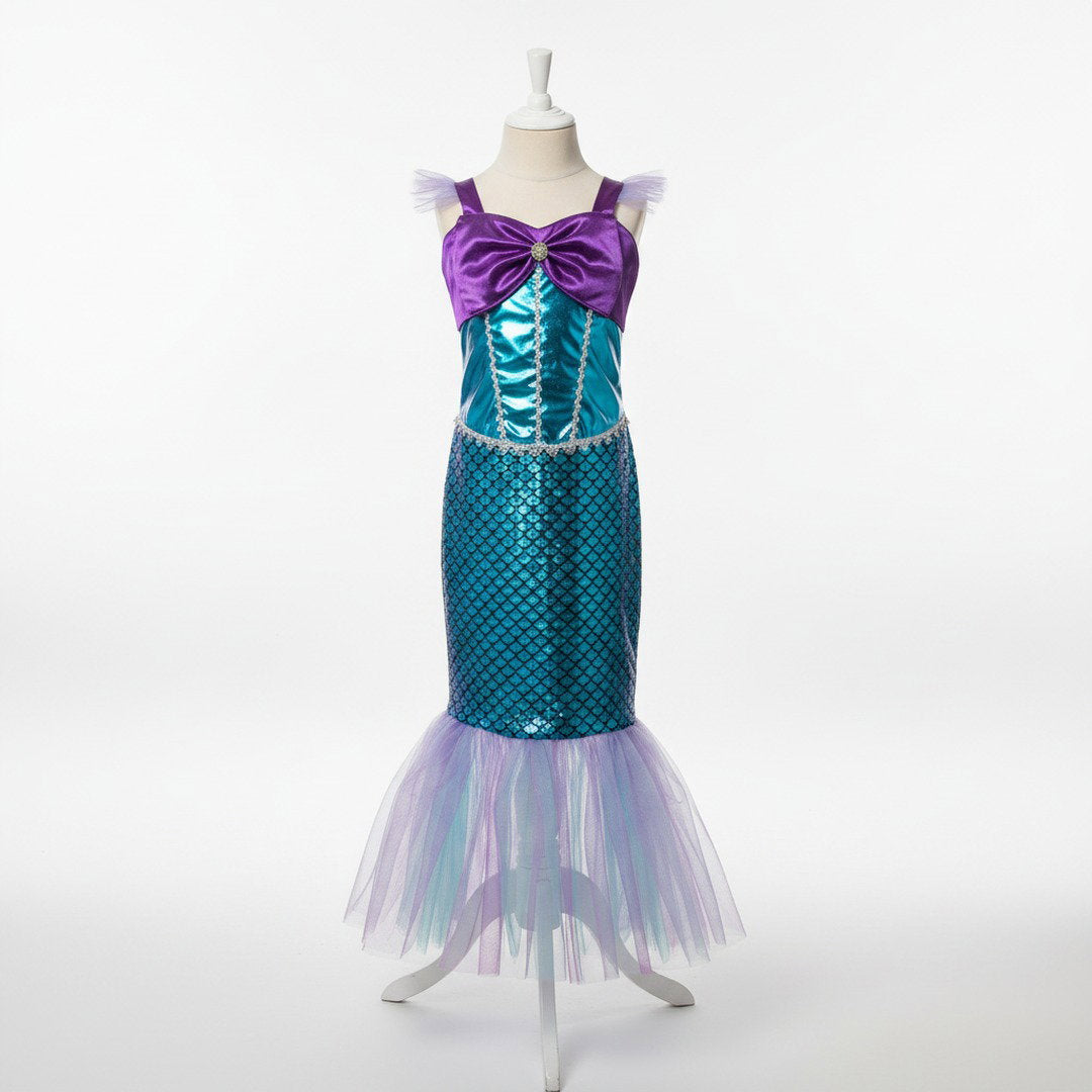Elegante zeemeerminjurk met aansluitend lijfje, opvallende borststrik, sierlijke schubbenrok en volumineuze tulevin