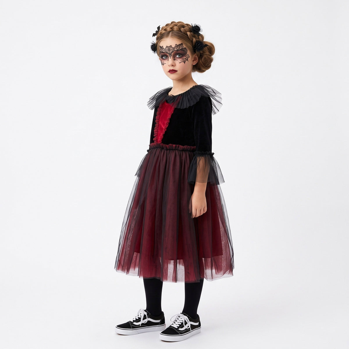 Elegante vampierjurk met sierlijk lijfje, opvallend detail, speelse pofmouwen en een volle, zwierige rok