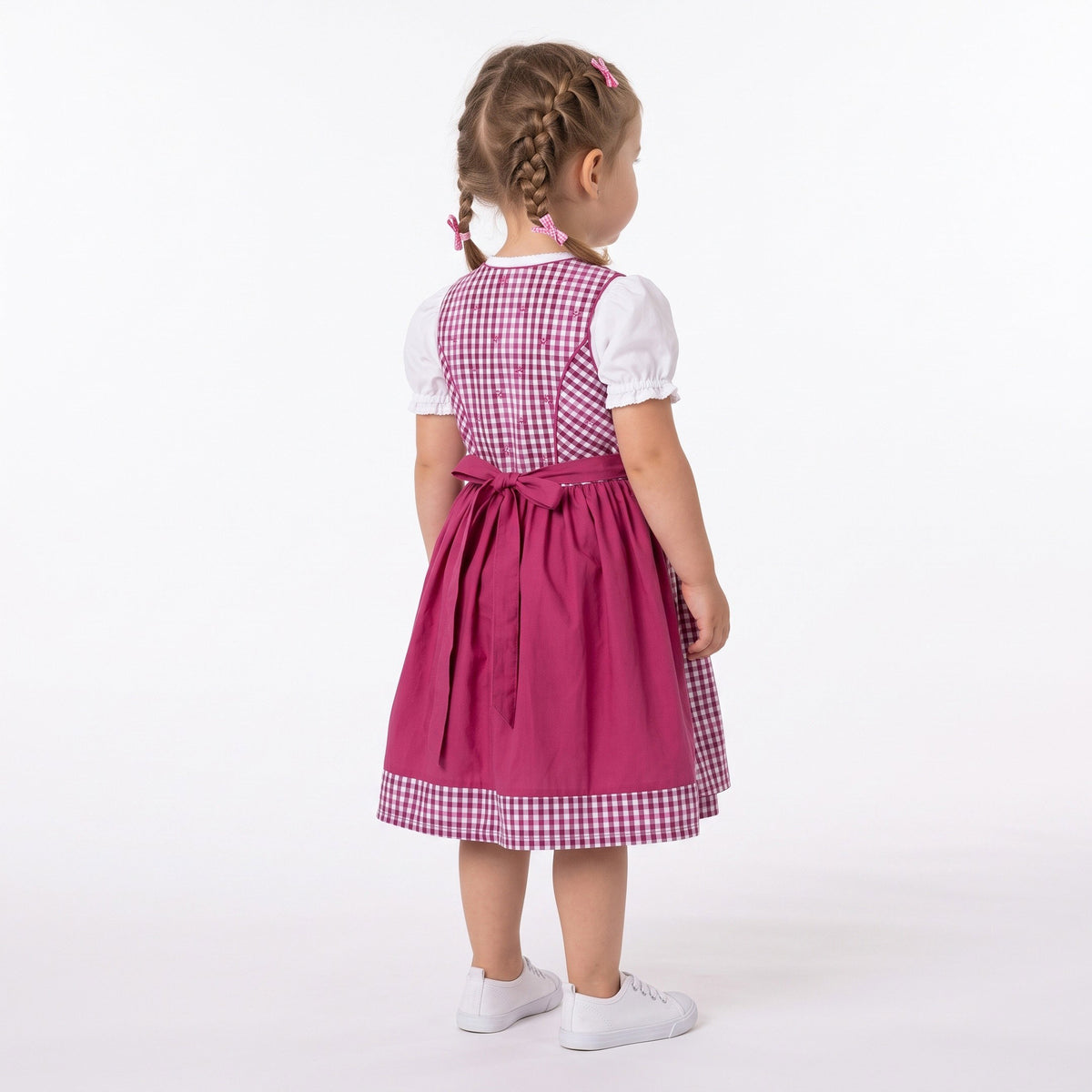 Vrolijke dirndljurk met geruit lijfje, kanten blousemouwen, sierlijke knoopjes, een brede strik in de taille en een volle rok