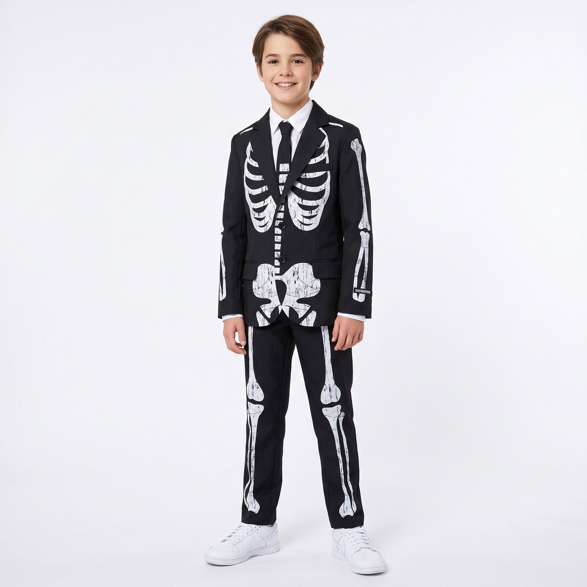 Stijlvol pak met jasje, hemd en das, afgewerkt met een opvallend skeletpatroon voor een mysterieuze, griezelige Halloweenlook.