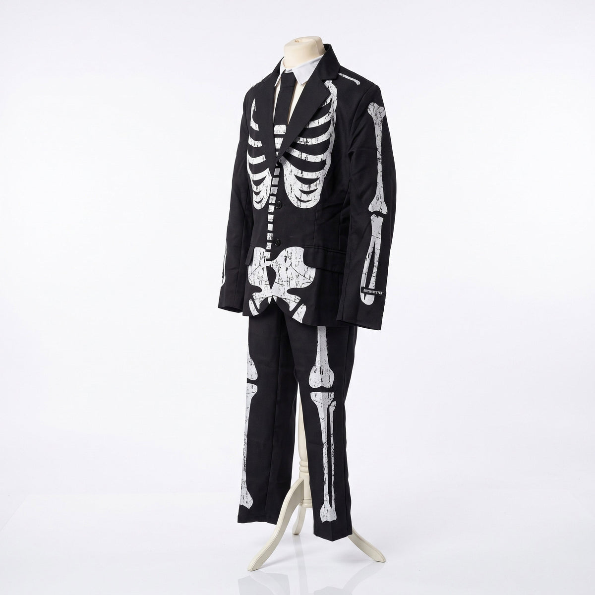 Stijlvol pak met jasje, hemd en das, afgewerkt met een opvallend skeletpatroon voor een mysterieuze, griezelige Halloweenlook.